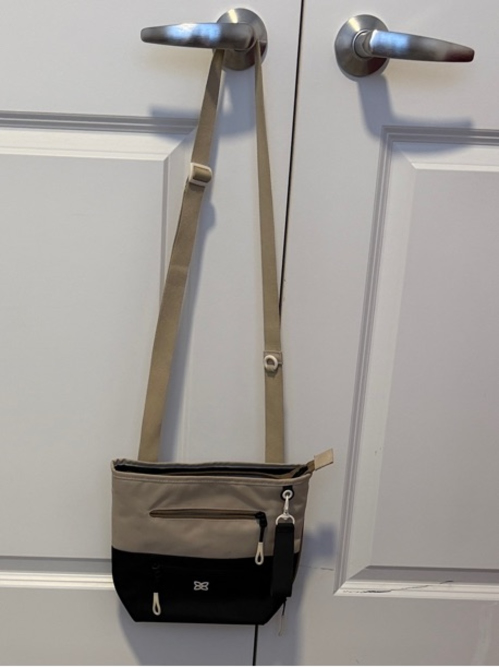 Sherpani beige and black crossbody bag